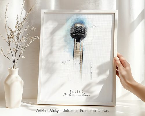 Art print of Dallas Reunion Tower in a white frame held by a hand, with a vase and dried flowers nearby.