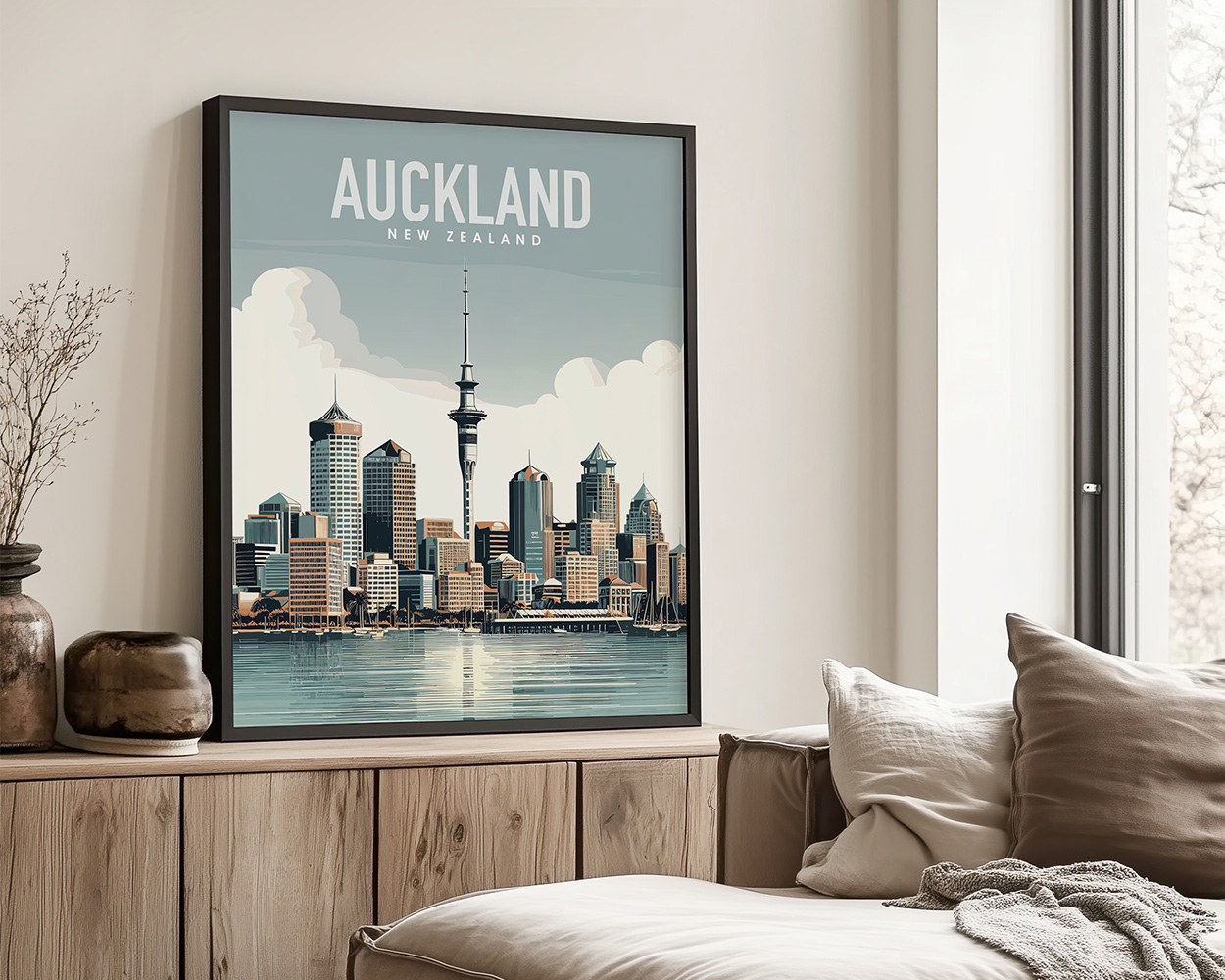 Art print of Auckland skyline featuring modern buildings and the Sky Tower against a blue sky.