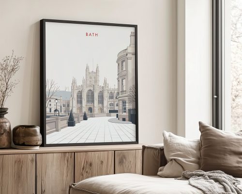 Framed artwork depicting a cityscape of Bath with architectural details and a clear sky.
