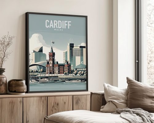 Framed artwork depicting a cityscape of Cardiff, Wales with notable buildings and a river.