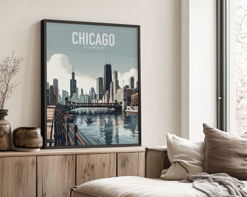 Framed artwork depicting a Chicago cityscape with buildings and a river.