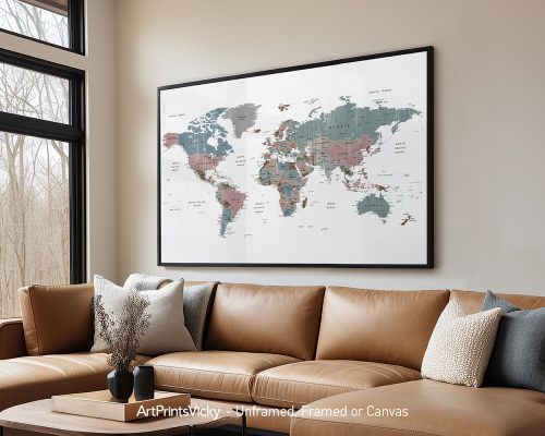Framed world map artwork displayed on a wall above a brown leather sofa.