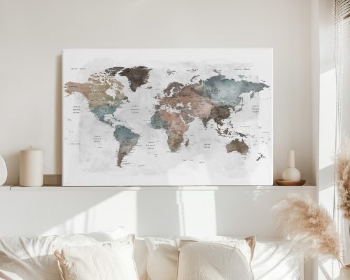 A world map artwork featuring muted colors and a watercolor effect displayed on a wall.