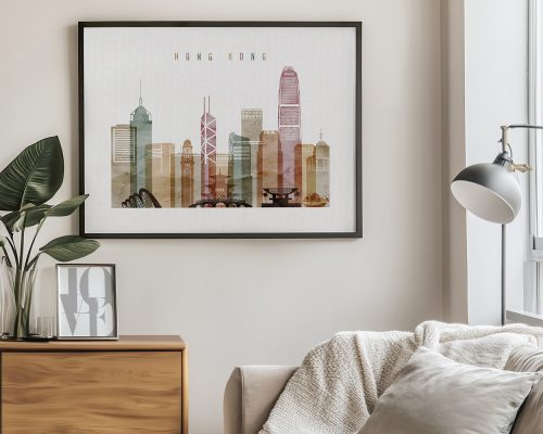 Framed artwork depicting a stylized cityscape of Hong Kong with various skyscrapers.