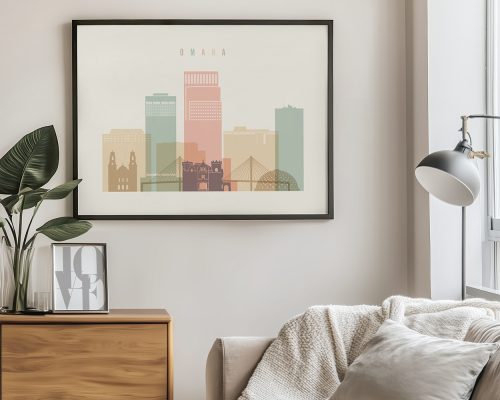 Stylized cityscape print of Omaha featuring buildings in various colors and a framed design.