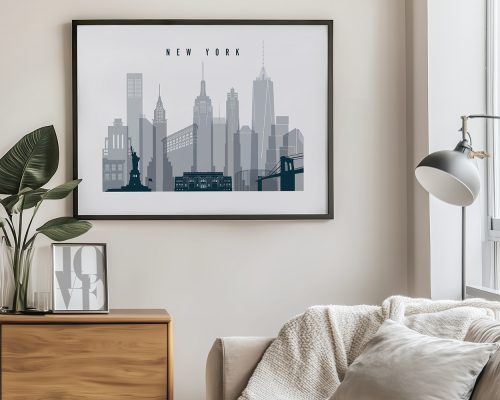 Framed artwork depicting the skyline of New York City in shades of gray.