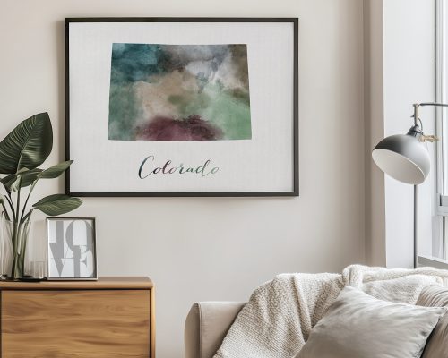 Framed abstract artwork titled 'Colorado' featuring green and brown watercolor textures.