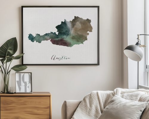 Watercolor illustration of Austria in muted colors, framed and displayed on a wall.