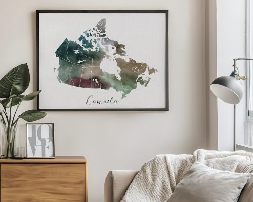Framed watercolor map of Canada with a blend of green and brown colors on a wall.
