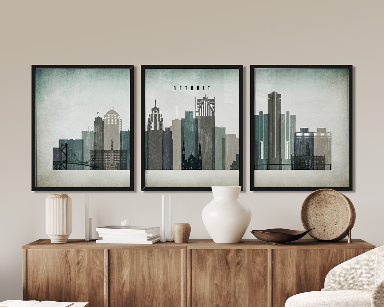Triptych artwork featuring a stylized cityscape of Detroit with buildings and a bridge.