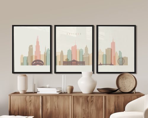 Three framed art prints of Chicago's skyline featuring various buildings in pastel colors.