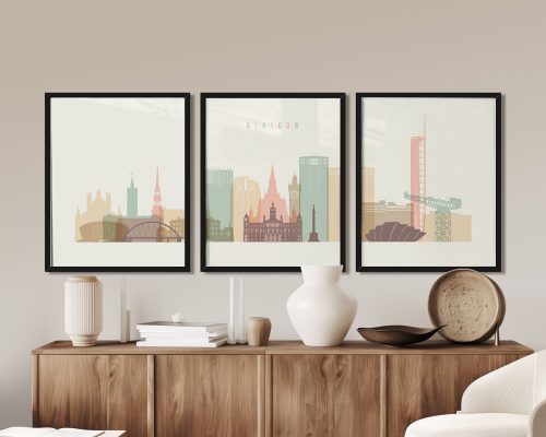 Three framed prints depicting a stylized cityscape of Glasgow with buildings and landmarks.