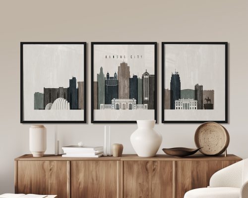 Three framed art prints depicting the skyline of Kansas City in a minimalist style.