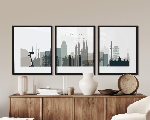 Three framed art prints depicting the skyline of Barcelona with notable landmarks.