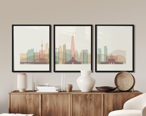 Three framed art prints depicting a stylized cityscape of Seoul with notable landmarks.