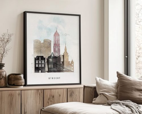 Framed artwork depicting a cityscape of Utrecht with buildings and a tower in soft colors.