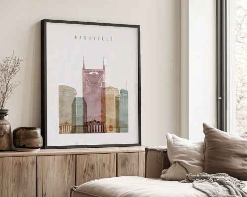 Framed artwork featuring a stylized cityscape of Nashville with notable buildings.