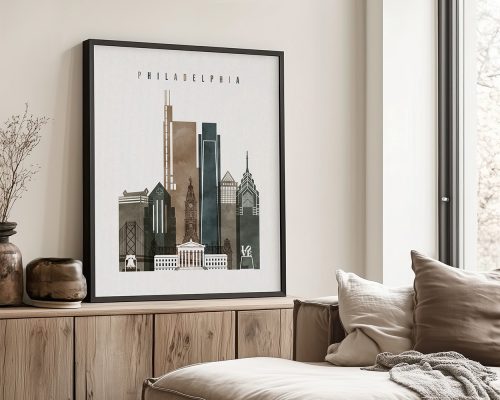 Framed artwork depicting the skyline of Philadelphia with notable buildings and landmarks.