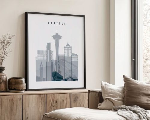 Framed artwork depicting a cityscape of Seattle with prominent buildings and the Space Needle.