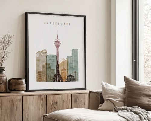 Framed cityscape print of Düsseldorf featuring buildings and a tower in muted colors.