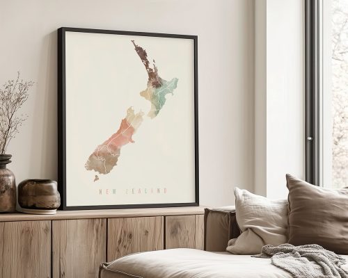 Framed map of New Zealand displayed on a wall with a neutral background.