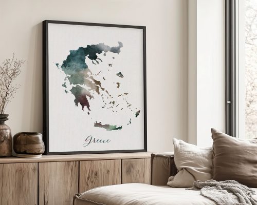 Watercolor map of Greece displayed in a black frame on a wall.