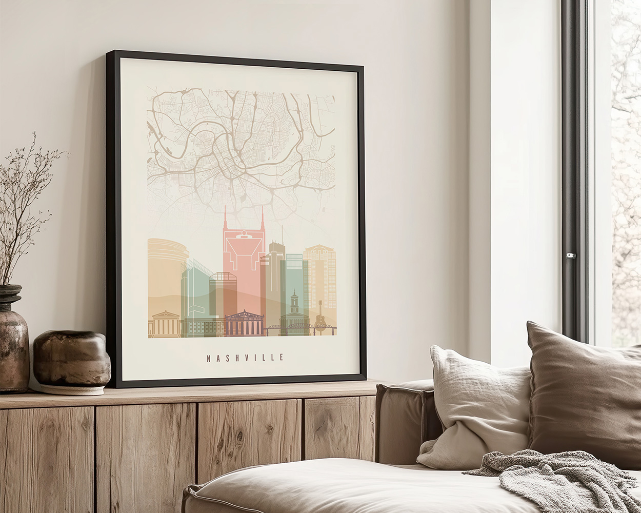 Framed artwork of Nashville city skyline with a map background displayed on a wooden shelf.