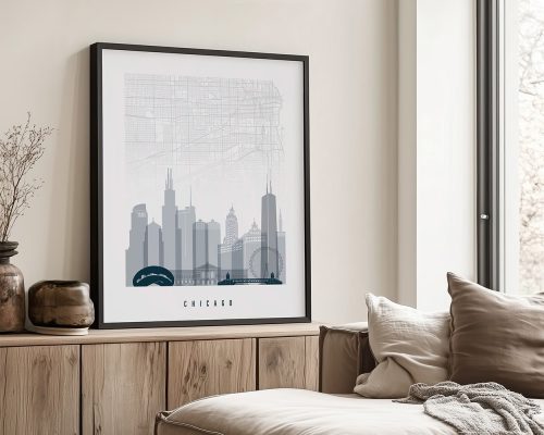 Framed print of a Chicago cityscape featuring notable buildings and a map outline.