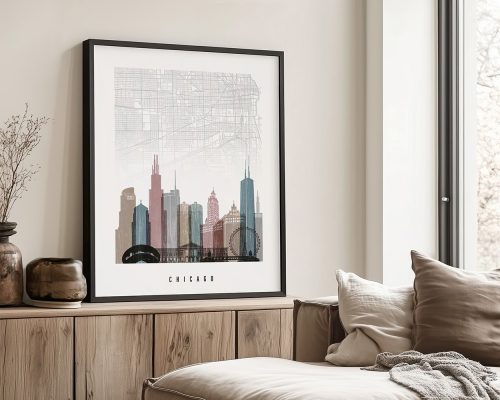 Framed artwork depicting a cityscape of Chicago with a map overlay and prominent buildings.