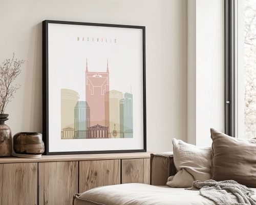 Framed art print of Nashville cityscape featuring various buildings in pastel colors.