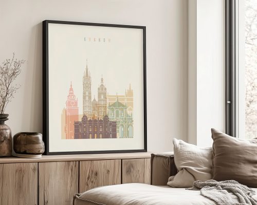 Framed artwork depicting a stylized cityscape of Krakow with notable buildings and towers.