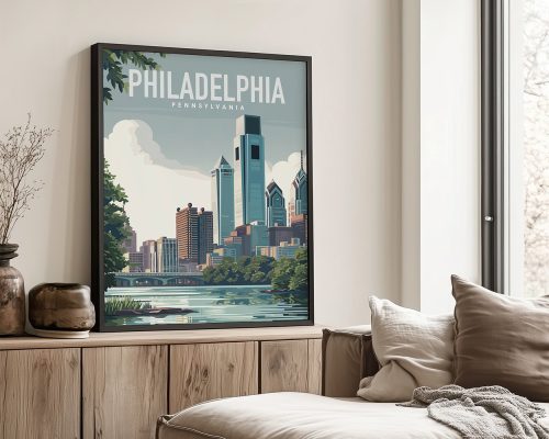 Art print of Philadelphia skyline featuring buildings and water in a framed display.