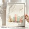Art print of Philadelphia featuring a stylized city map and skyline in soft colors.