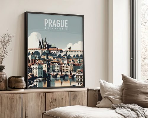 Framed artwork depicting a cityscape of Prague, Czech Republic, with notable buildings and a river.