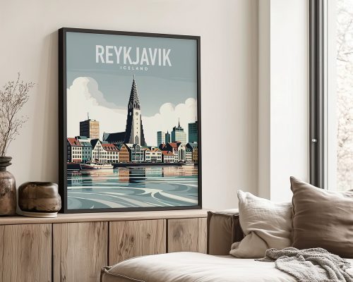 Framed artwork depicting Reykjavik, Iceland with a prominent church and colorful buildings along the waterfront.