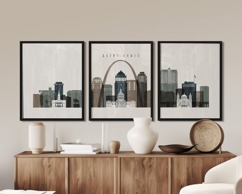 Three framed art prints depicting the cityscape of Saint Louis with the Gateway Arch.