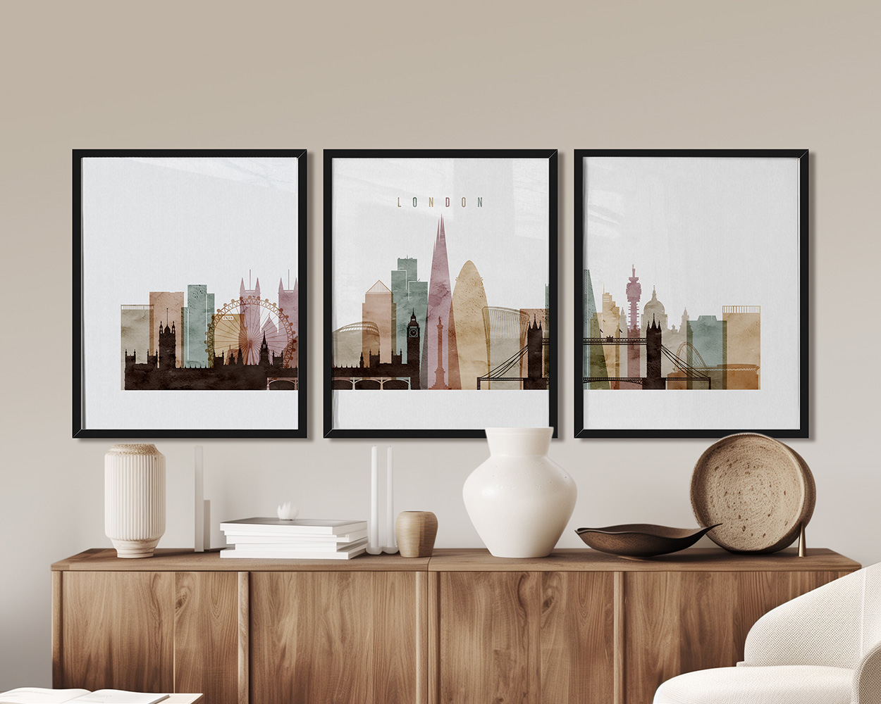 Three framed art prints of London's skyline featuring iconic landmarks in soft colors.