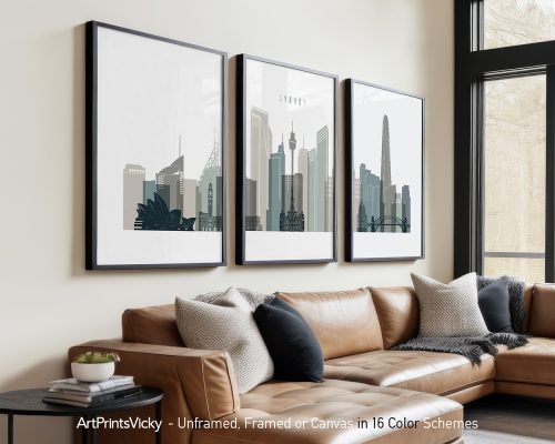 Three framed art prints depicting a stylized cityscape of Sydney with iconic buildings.