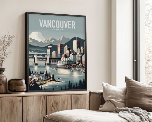 Framed artwork depicting a cityscape of Vancouver, Canada with mountains and water.