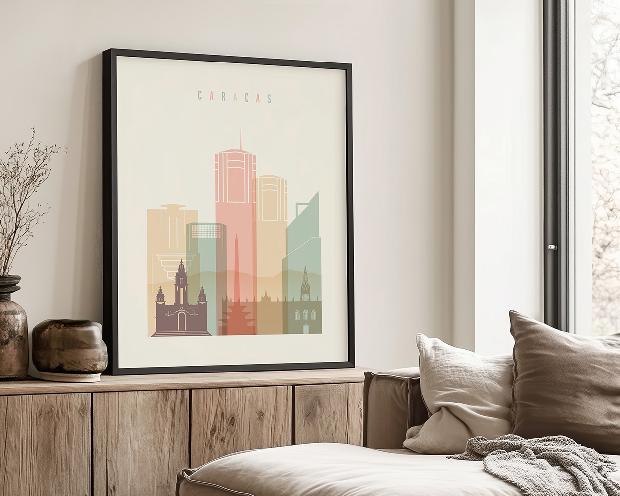 Art print featuring a stylized cityscape of Caracas with various building silhouettes in soft colors.