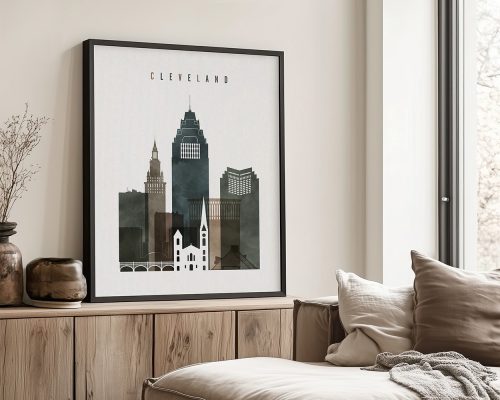 Framed artwork depicting a cityscape of Cleveland with notable buildings and skyline.