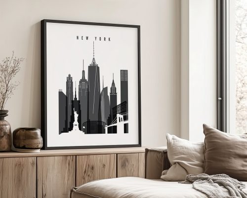 Framed artwork depicting the New York City skyline with notable buildings and landmarks.
