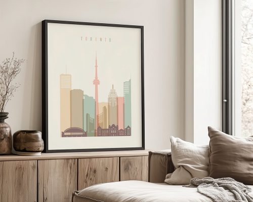 Framed artwork depicting a stylized cityscape of Toronto with the CN Tower and various buildings.