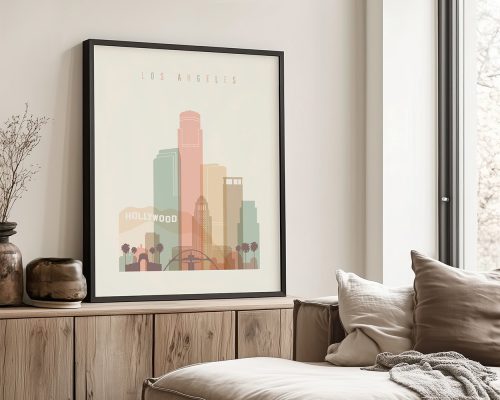 Framed artwork depicting a stylized cityscape of Los Angeles with notable buildings and the Hollywood sign.