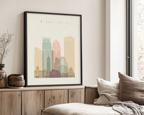 Framed artwork depicting a stylized cityscape of Minneapolis with pastel colors.