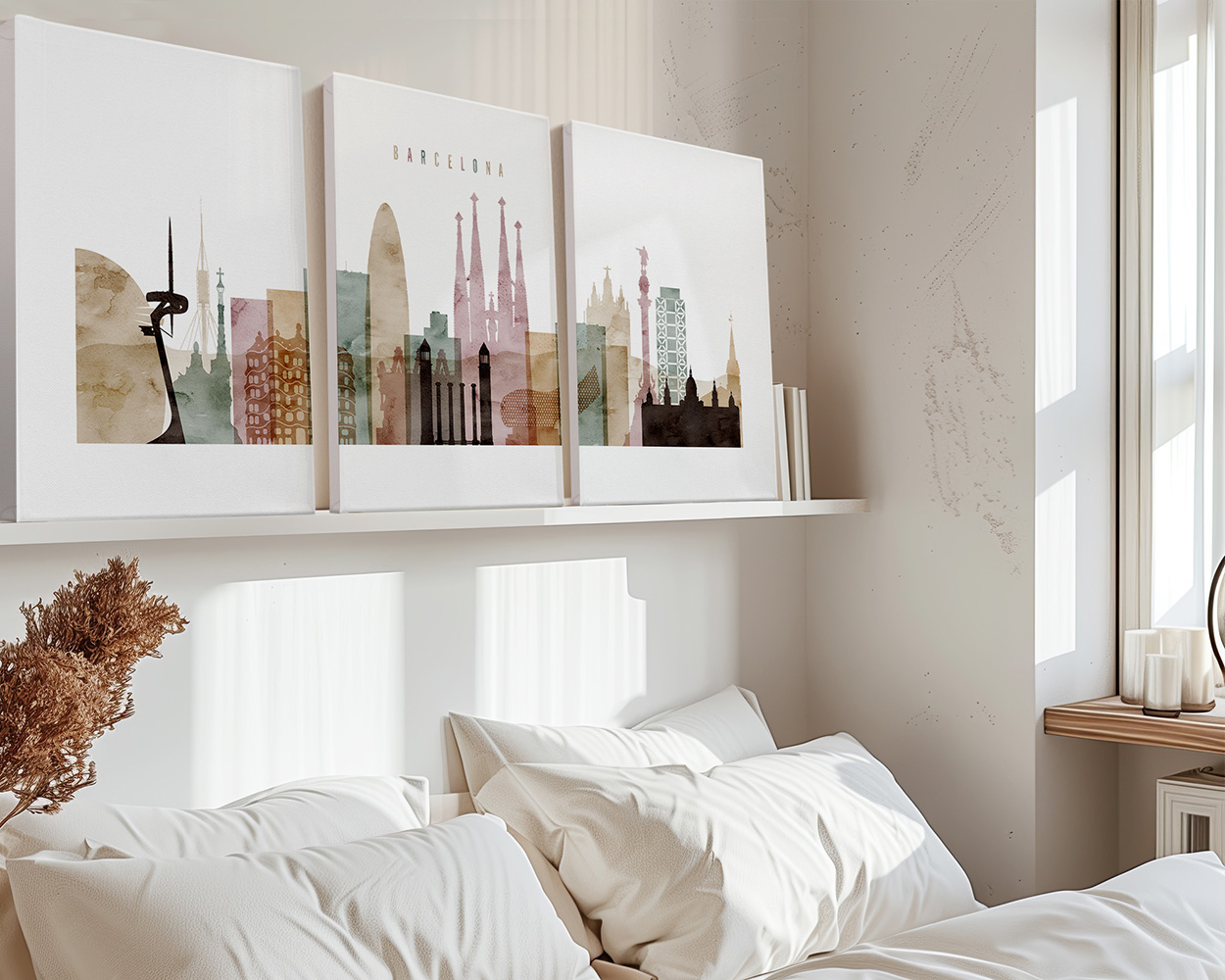Three art prints depicting a stylized Barcelona cityscape with notable landmarks in soft colors.