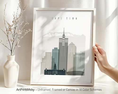 Framed cityscape print of Cape Town featuring notable buildings and mountains in the background.