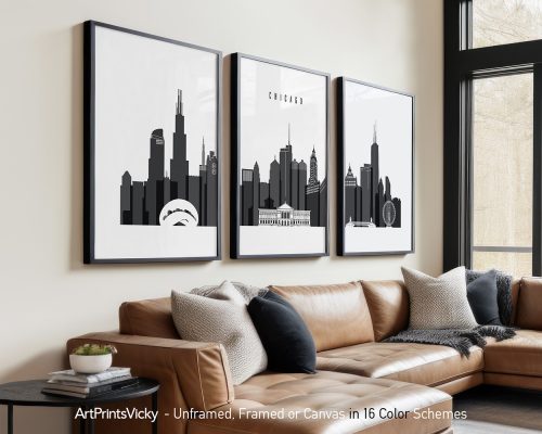 Three framed art prints of the Chicago skyline in black and white displayed on a wall.