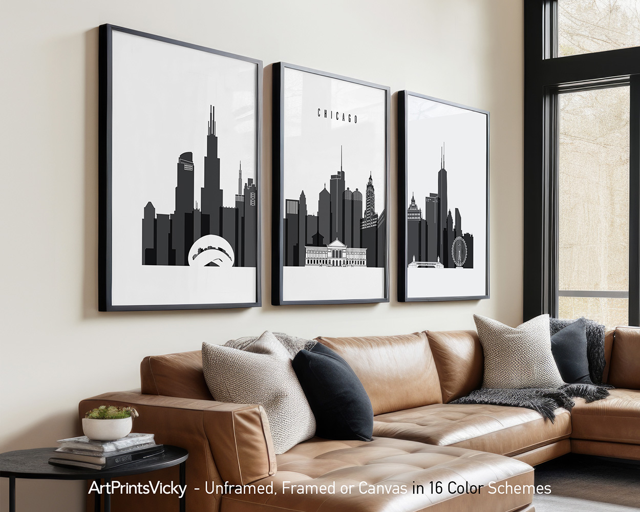 Three framed art prints of the Chicago skyline in black and white displayed on a wall.