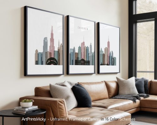 Three framed art prints of the Chicago skyline in various colors displayed on a wall.